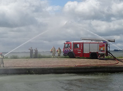 Foto van het ereteken door Brandweer Marken